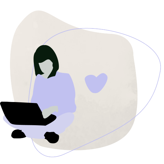 En kvinde sidder og arbejder med en laptop.